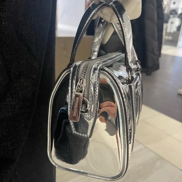 MICHAEL KORS Jet Set Small Patent Duffel Xbody Crossbody Bag
Silver 
NWT - Picture 4 of 16